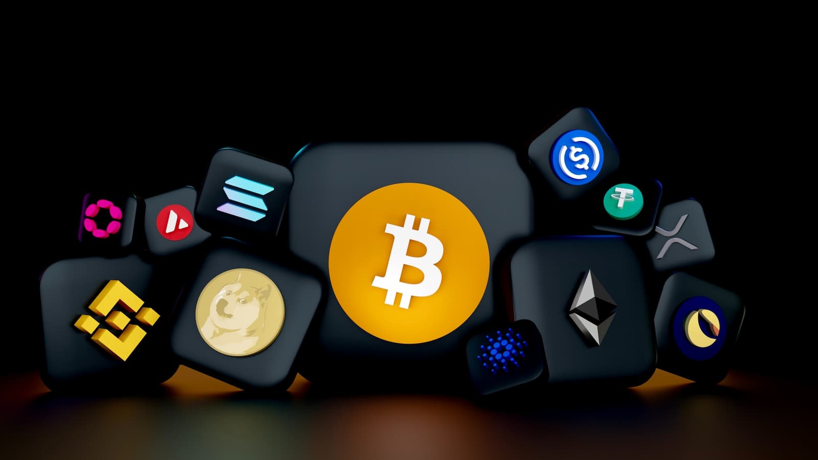 Icons diverser Kryptowährungen auf schwarzem Hintergrund