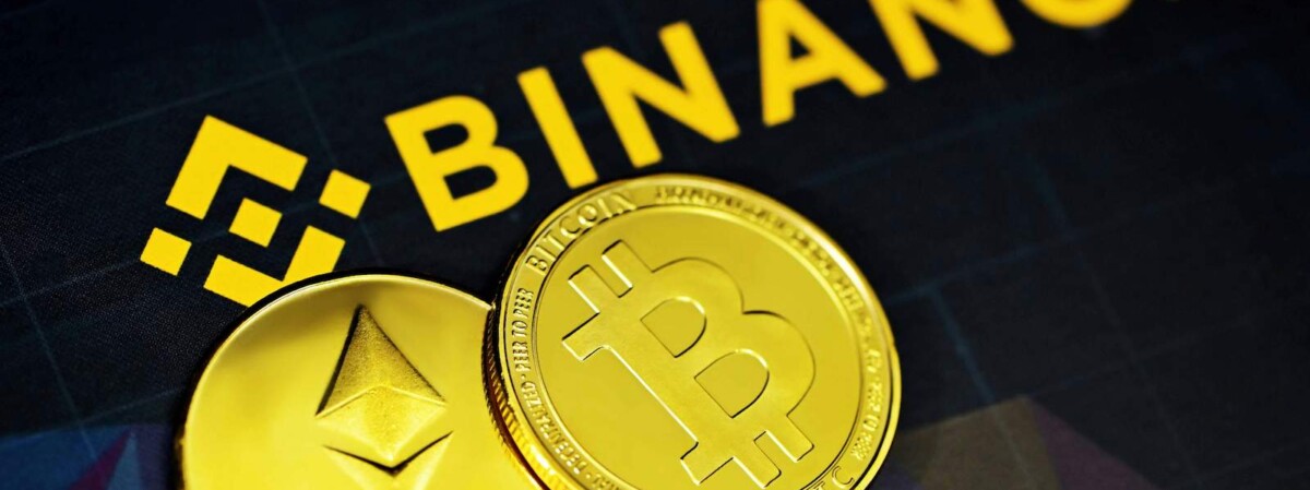 binance logo mit ethereum und bitcoin münzen